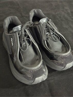 Prada Systeme Sneakers / Shoes marked size 7.5.
Unusual design